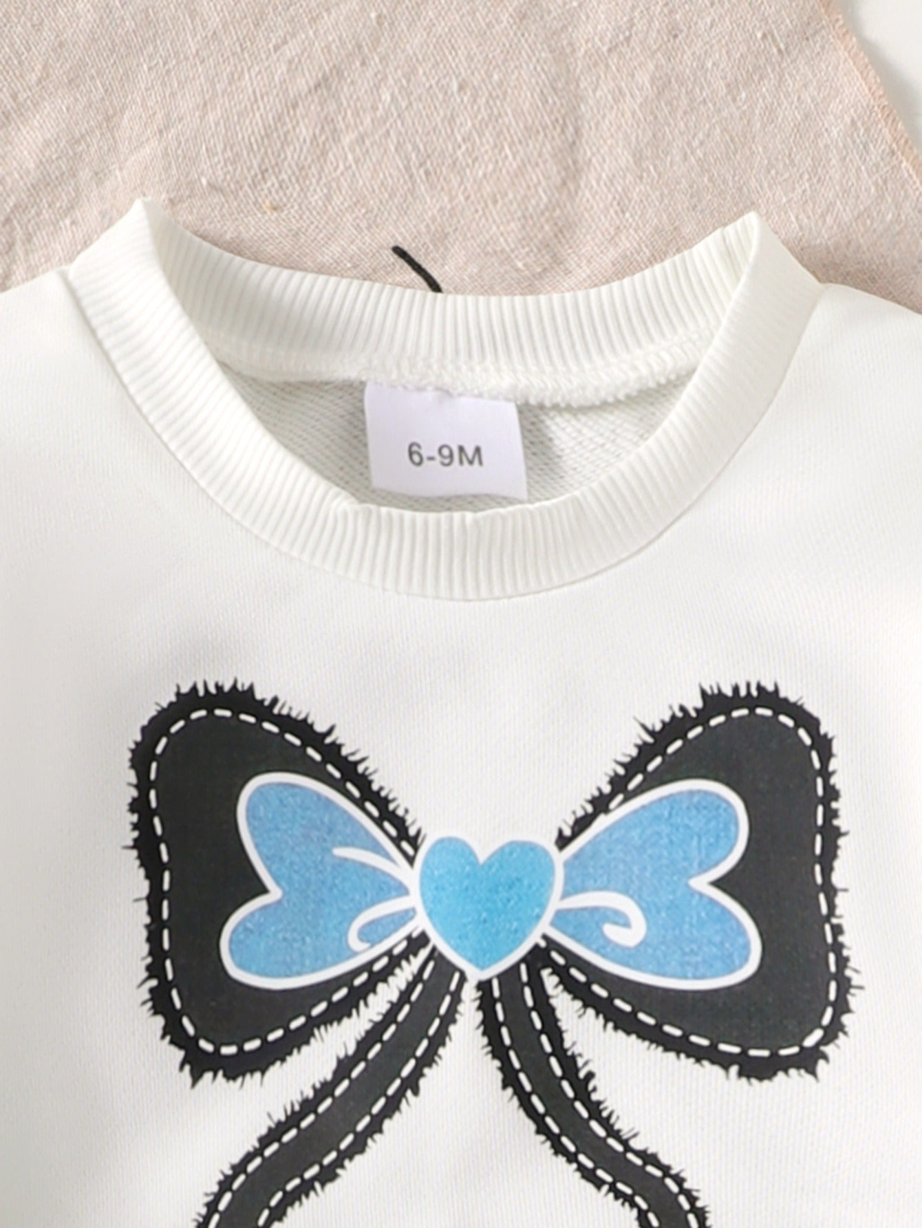 Girl suits with bow prints, long sleeves and flared pants, two-piece set